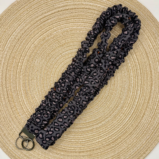 Telefoon scrunchie panter zwart